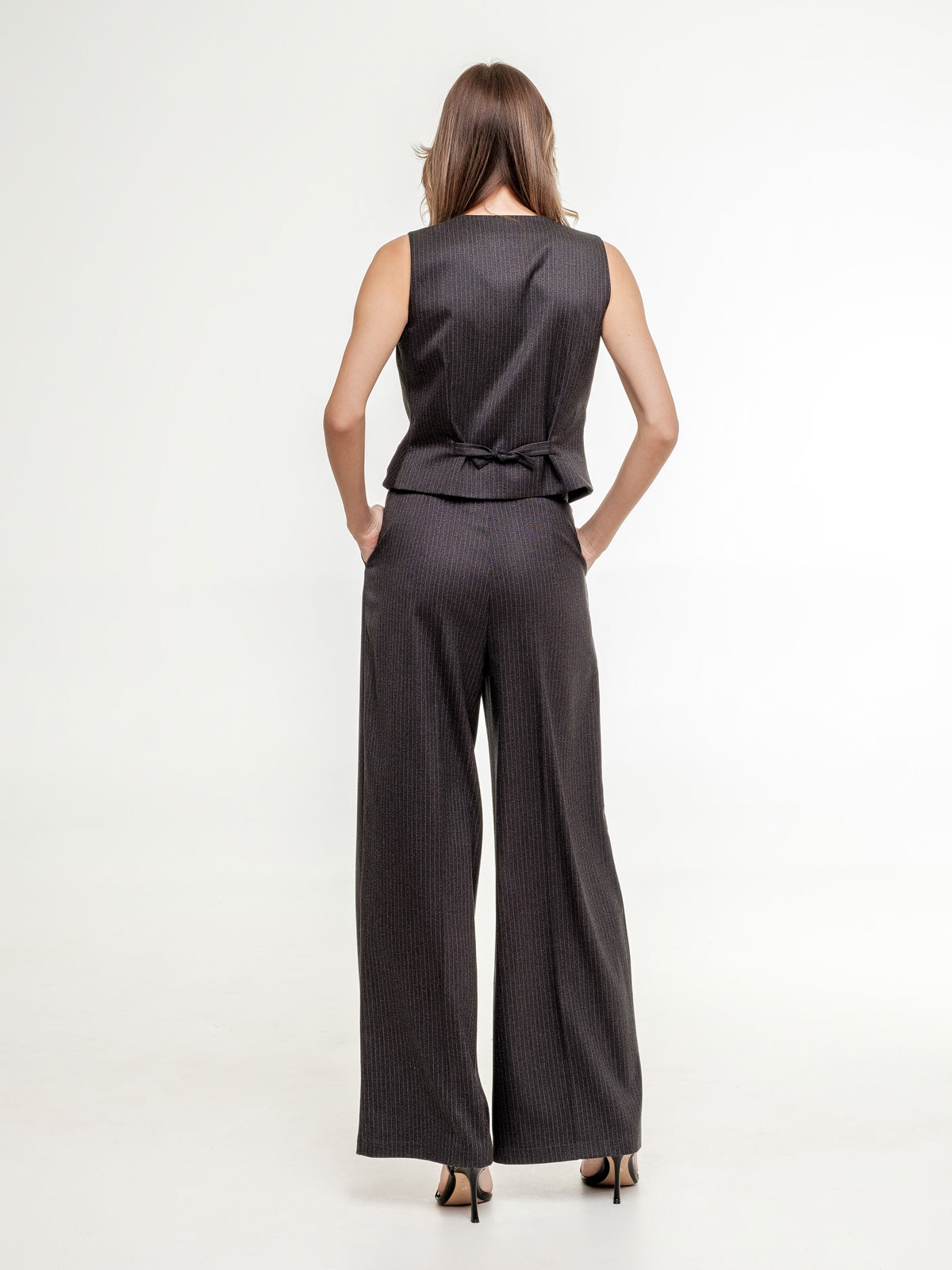 2 piece set dark grey vest and wide trousers view from the back