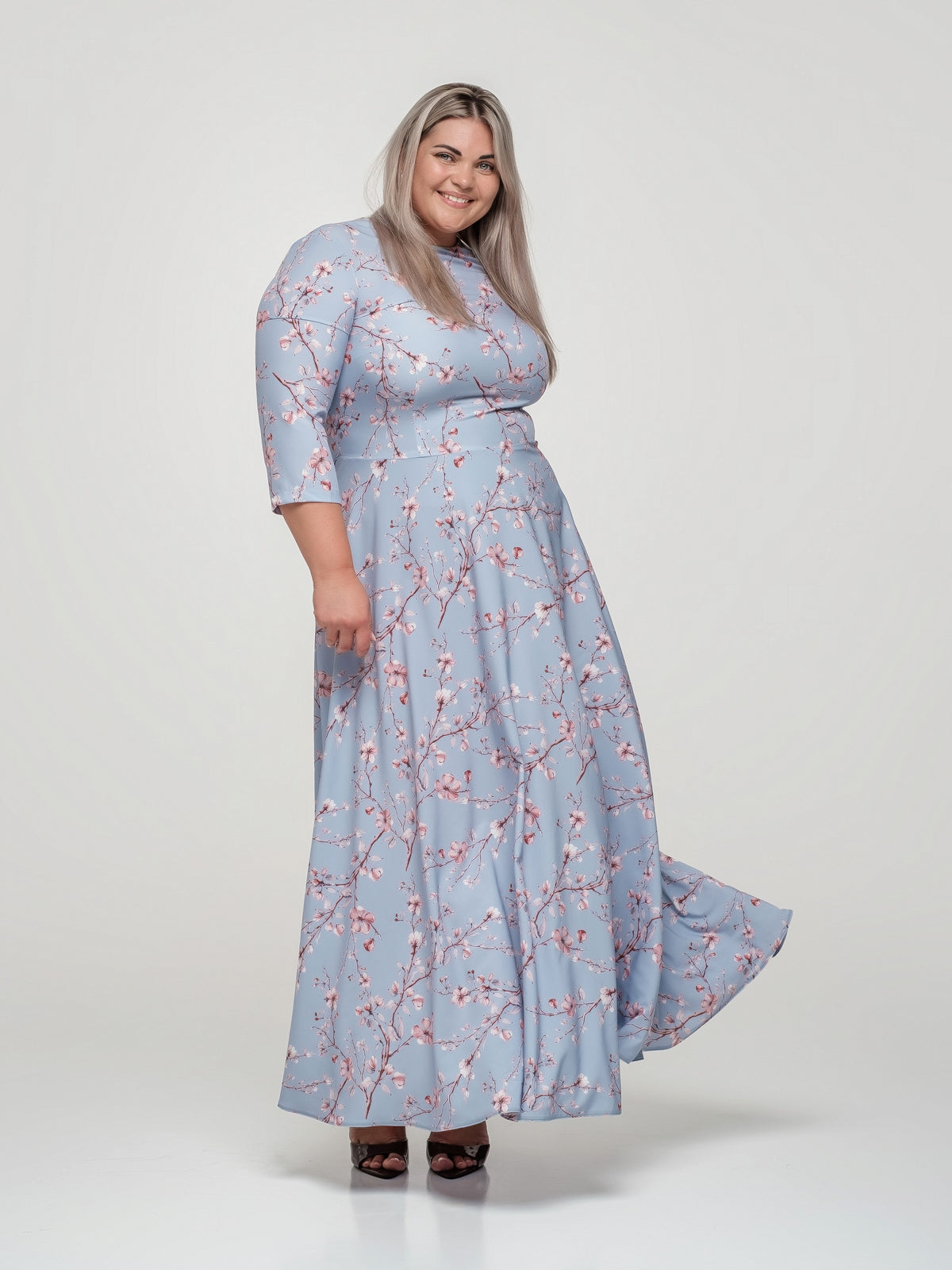 Classic light blue dress with a blooming branch print