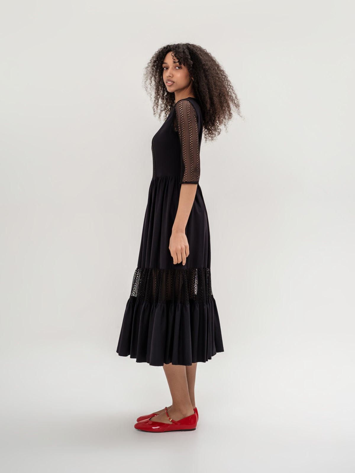 Black midi dress with lace accents 3/4 sleeve fitted top