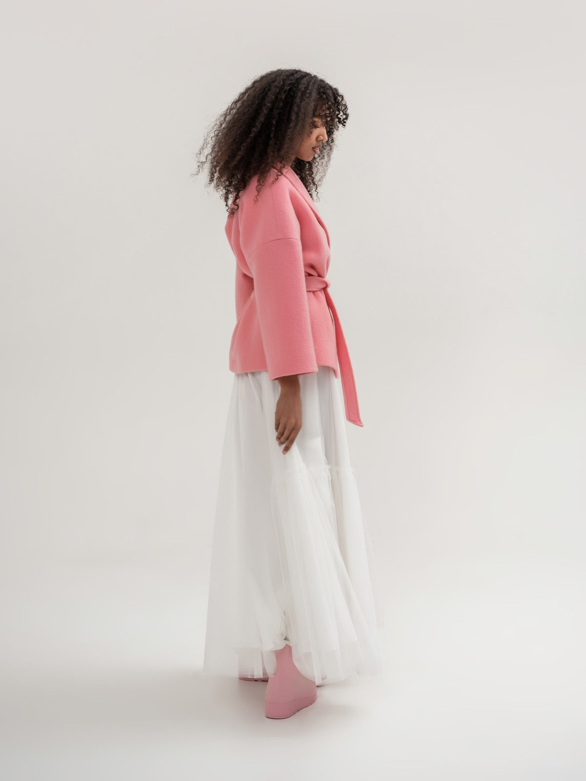 Coral coat and white tulle skirt