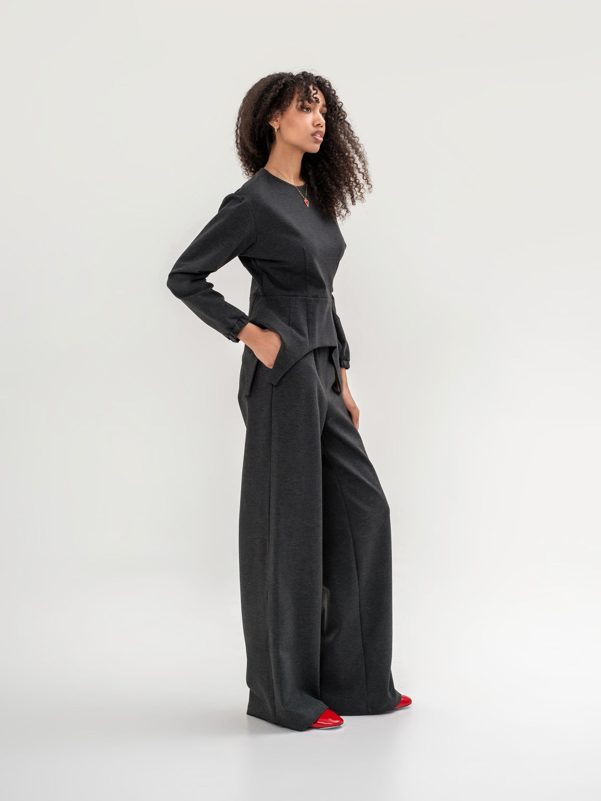 Garter inspired top with long sleeves and wide leg trousers
