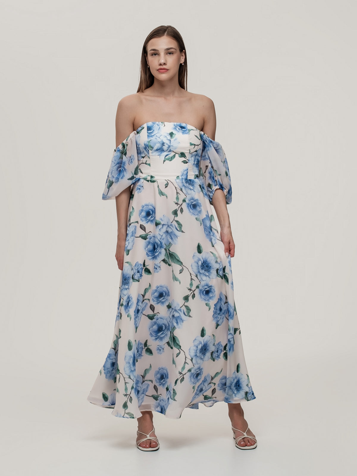 Long beautiful dress with corset and off-shoulder sleeves