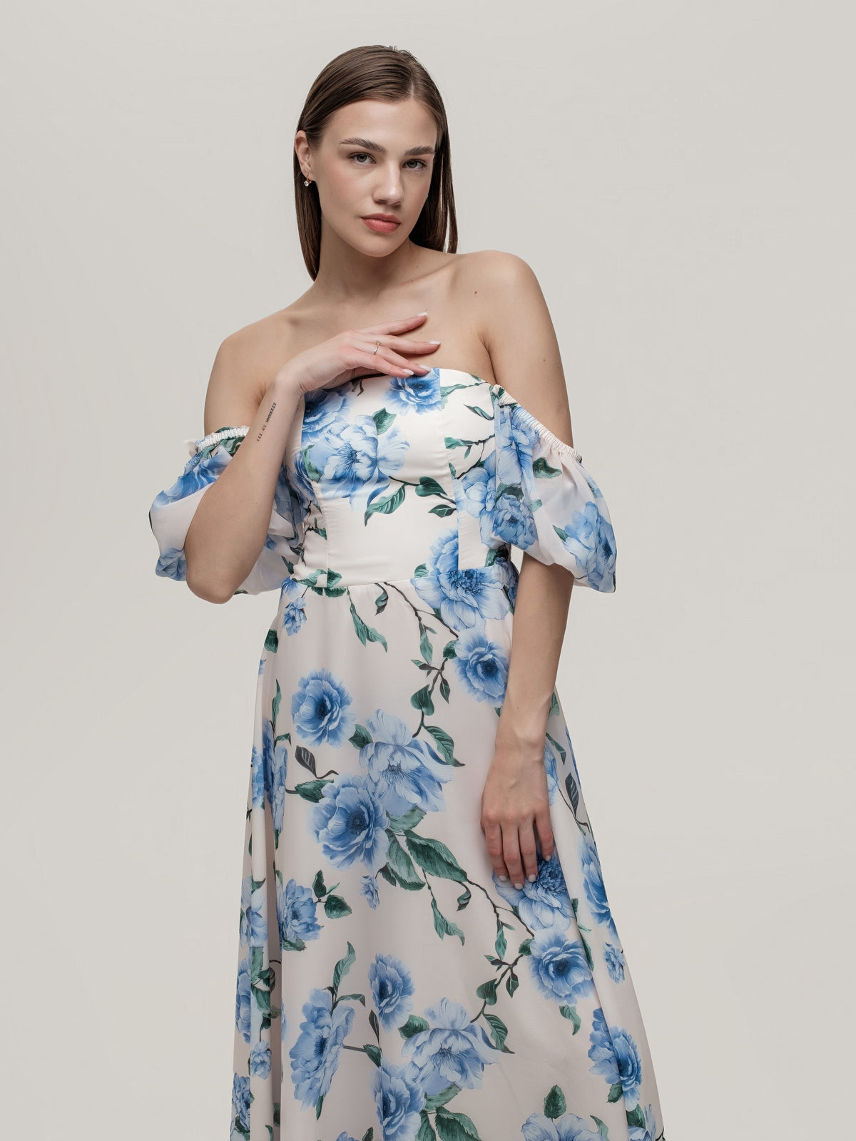 Long beautiful dress with corset and off-shoulder sleeves