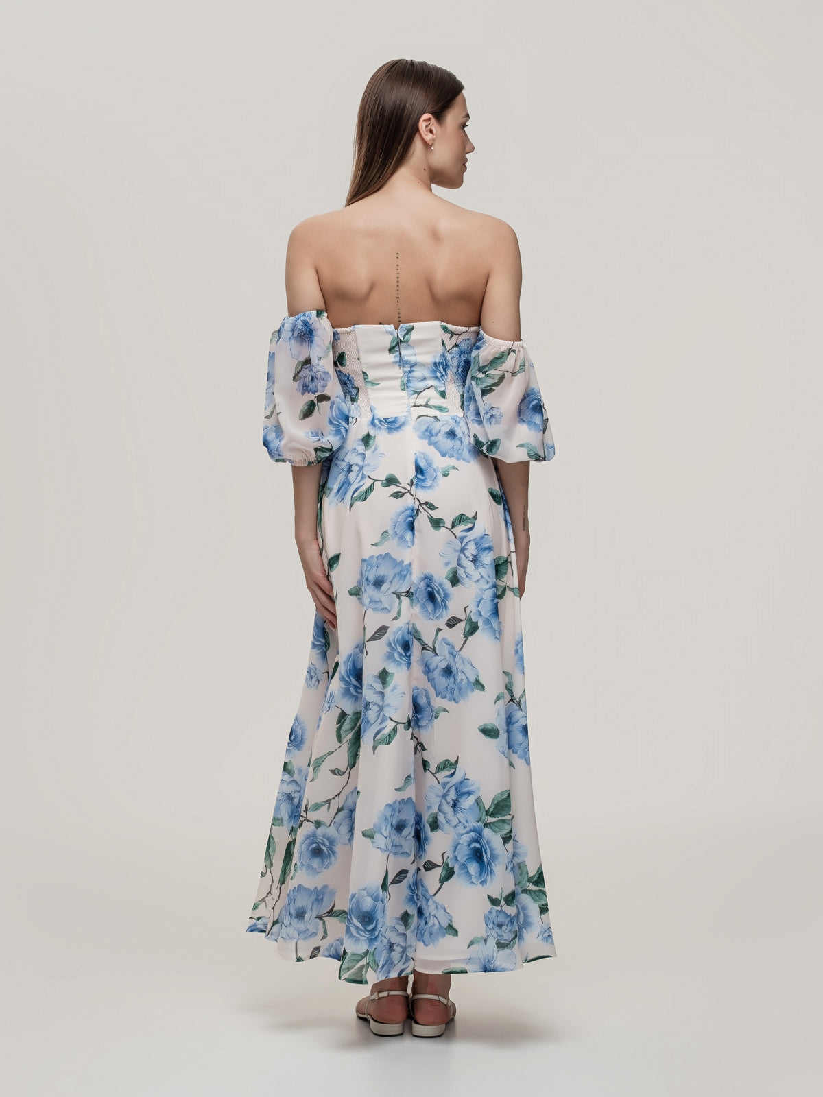 Long beautiful dress with corset and off-shoulder sleeves
