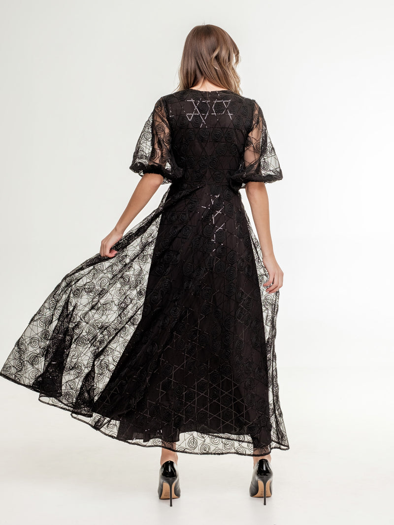 Luxurious_black_lace_dress_with_sequins_wide_skirt view from the back