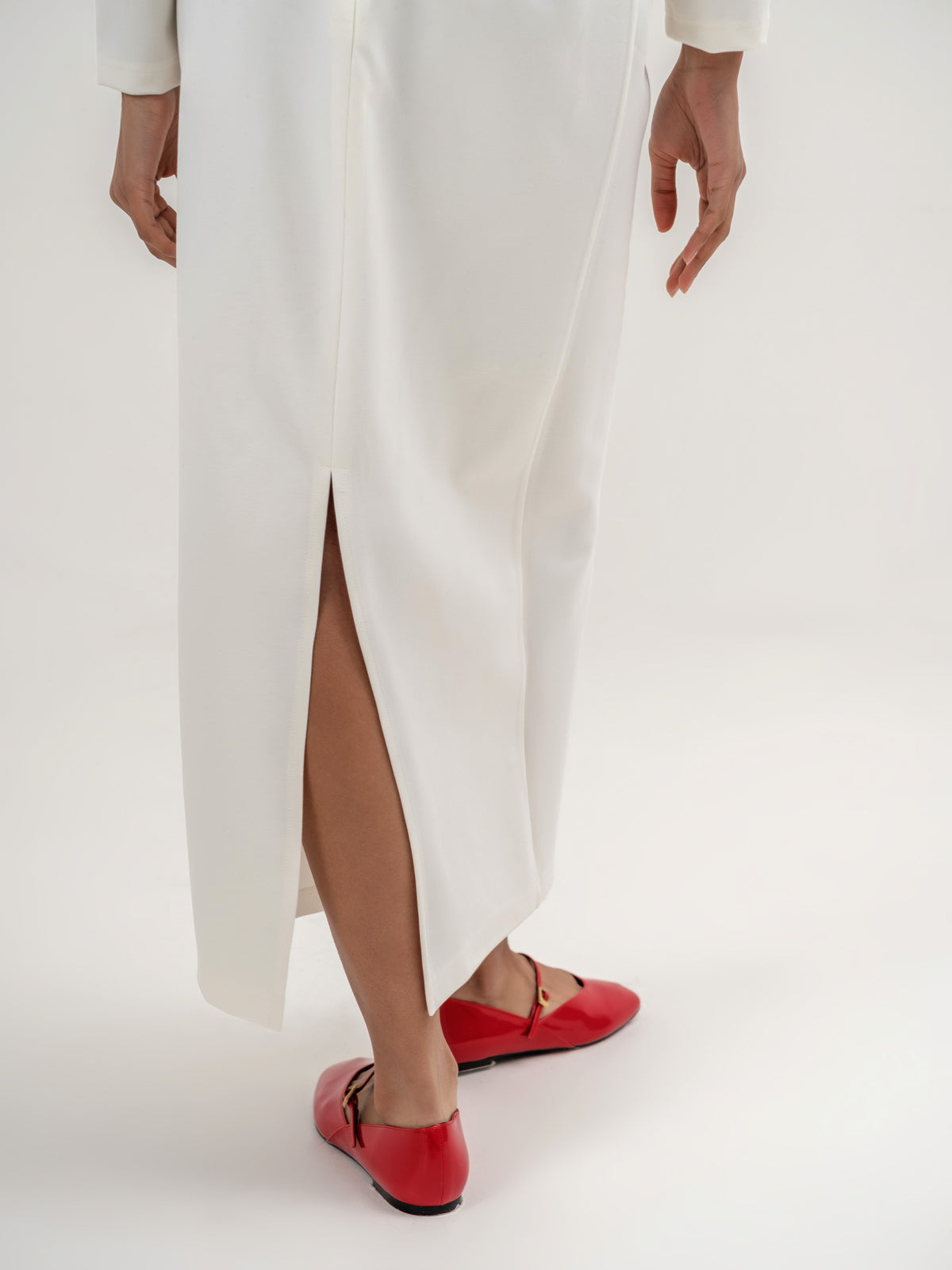 White straight long skirt with slit on the back