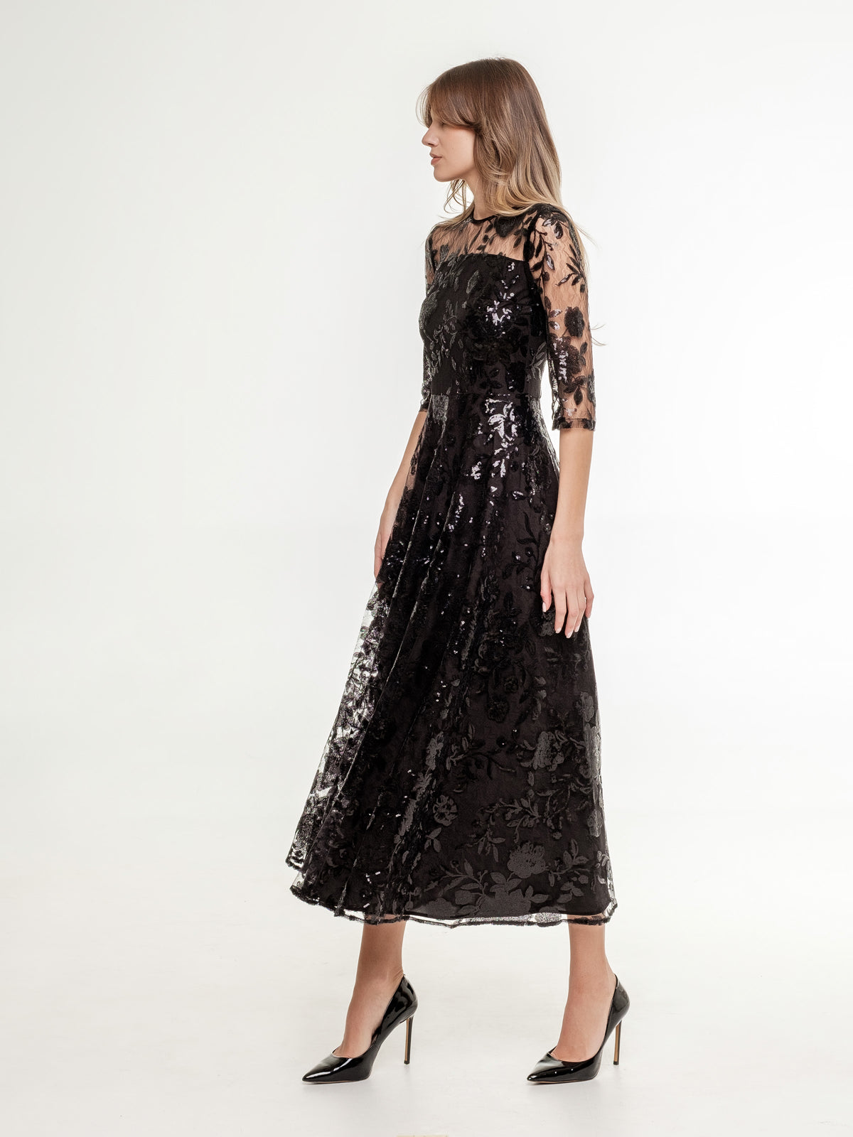 black_midi_lace_dress_with_luxurious_sequins_and_flowers and medium long sleeves with back zipper side view