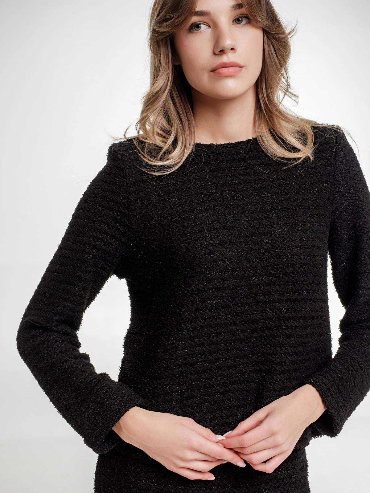 black textured top with long sleeves
