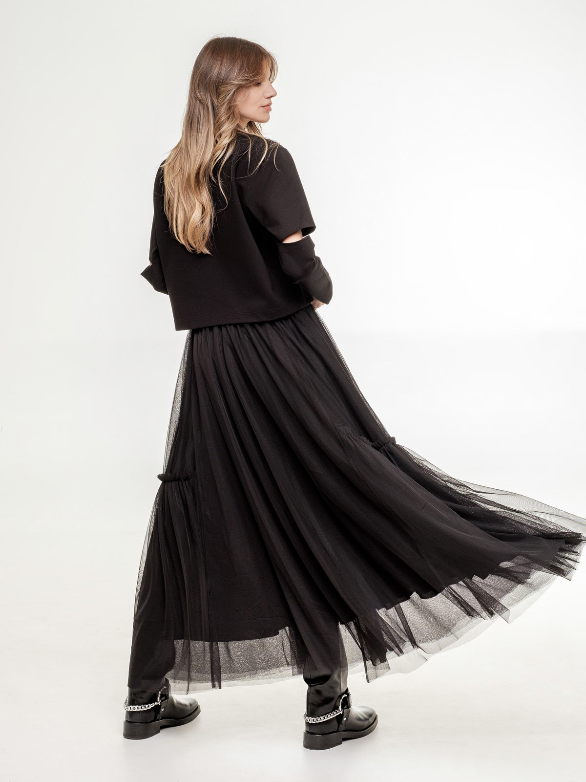 black tulle wide feminine skirt with black top side view