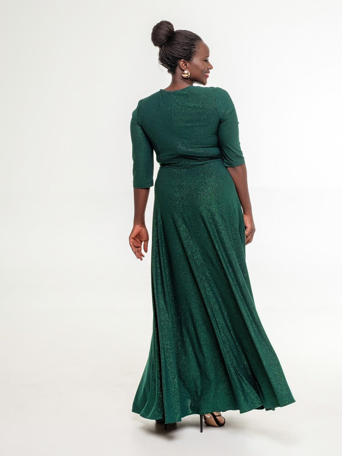 deep green long glittery occasion dress side L size model from the back