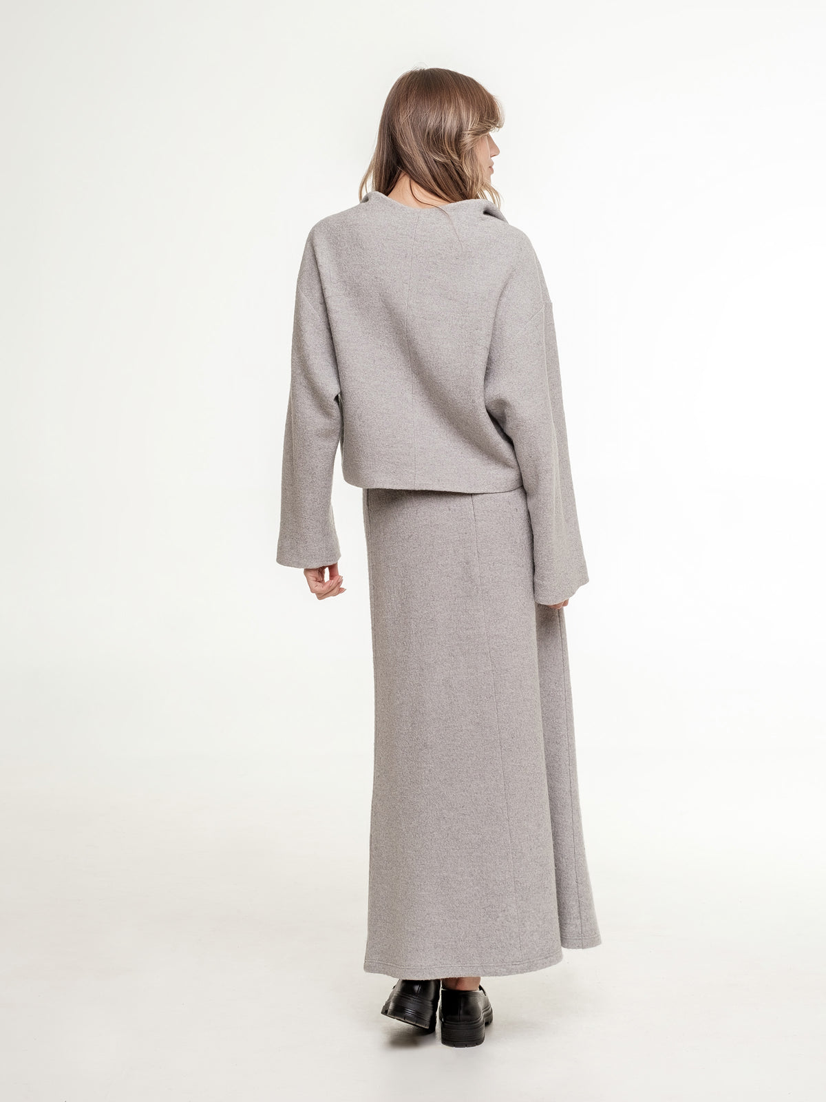 light_grey_wool_set_jacket_and_long_A-shaped_skirt_view_from_the_back