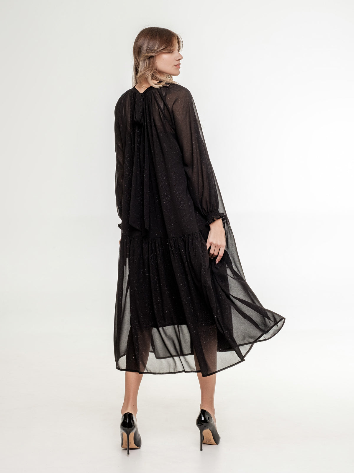 midi elegant black dress with long transparent sleeves from the back