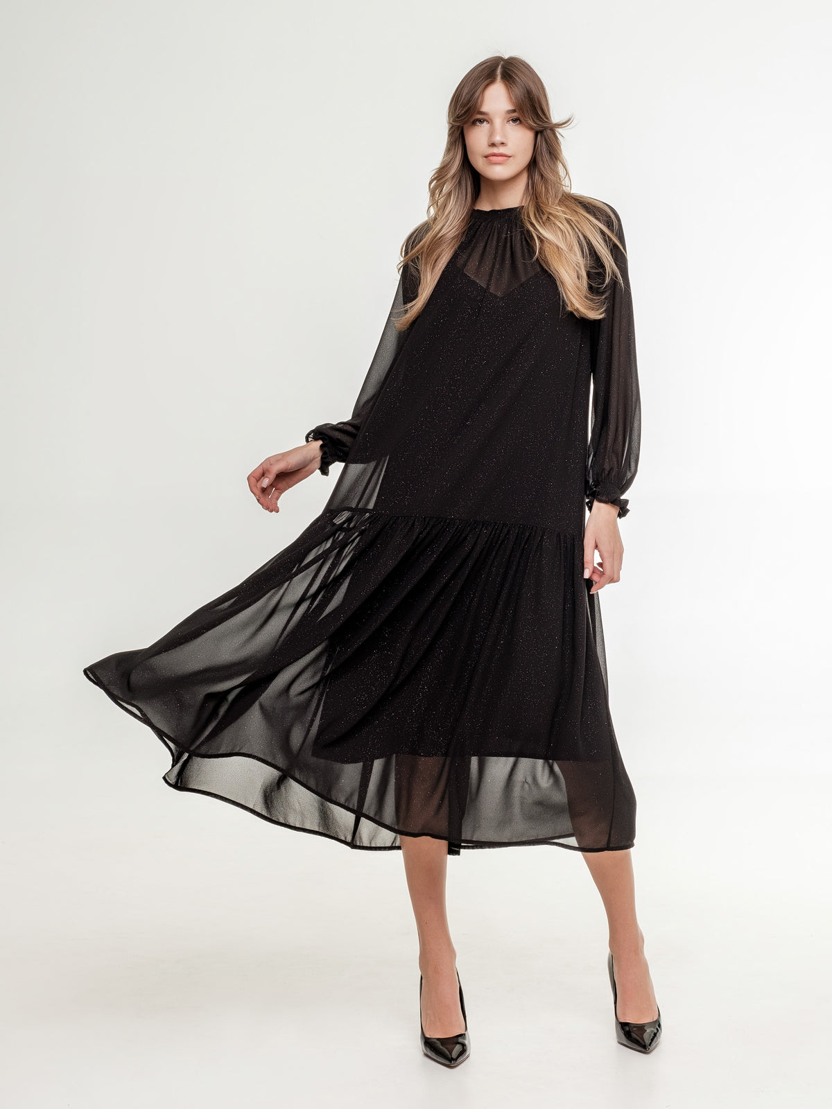 midi elegant black dress with long transparent sleeves and wide skirt