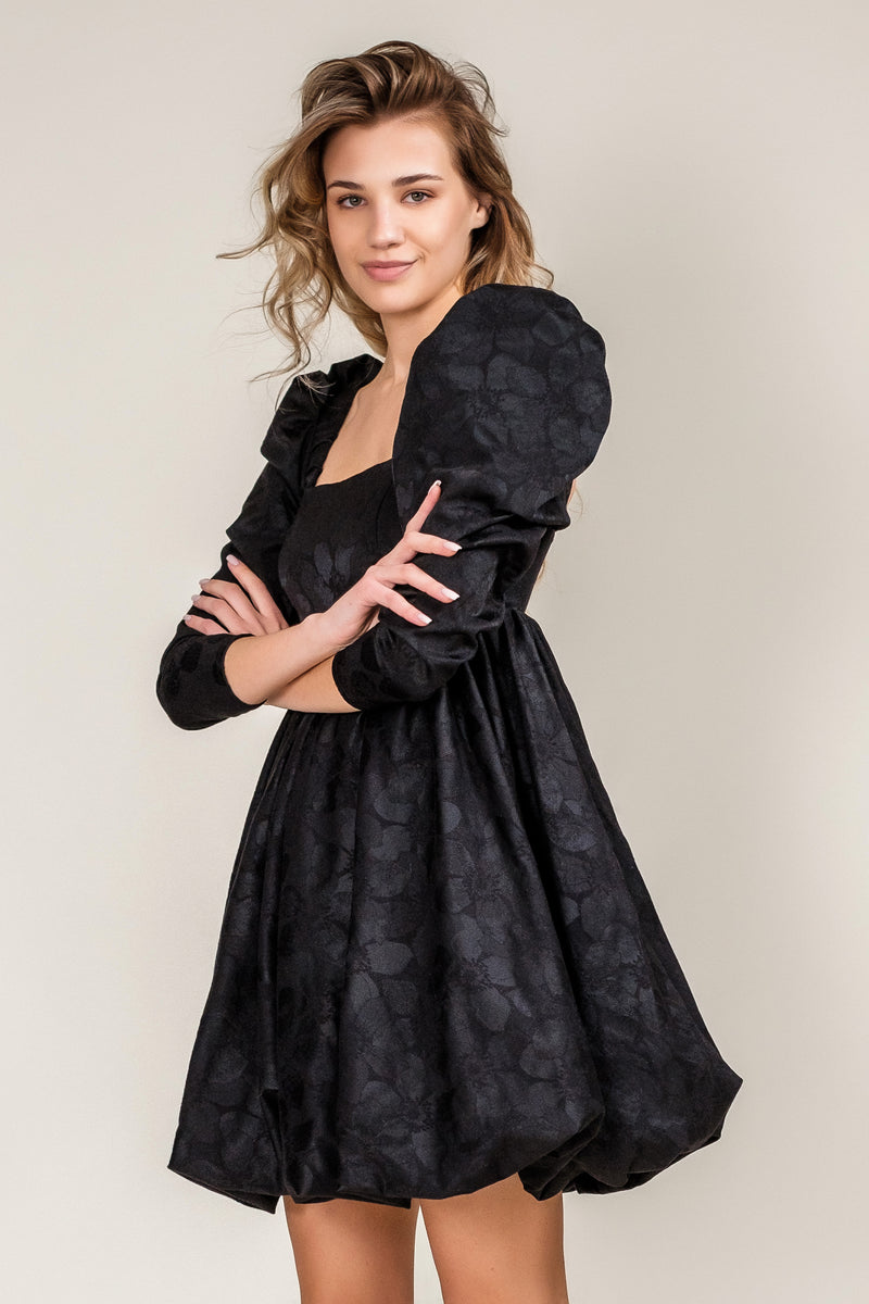 short modern black dress long sleeves high waist open back side view