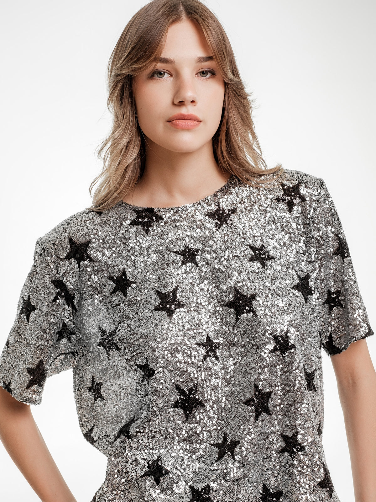 silver glitter top with stars