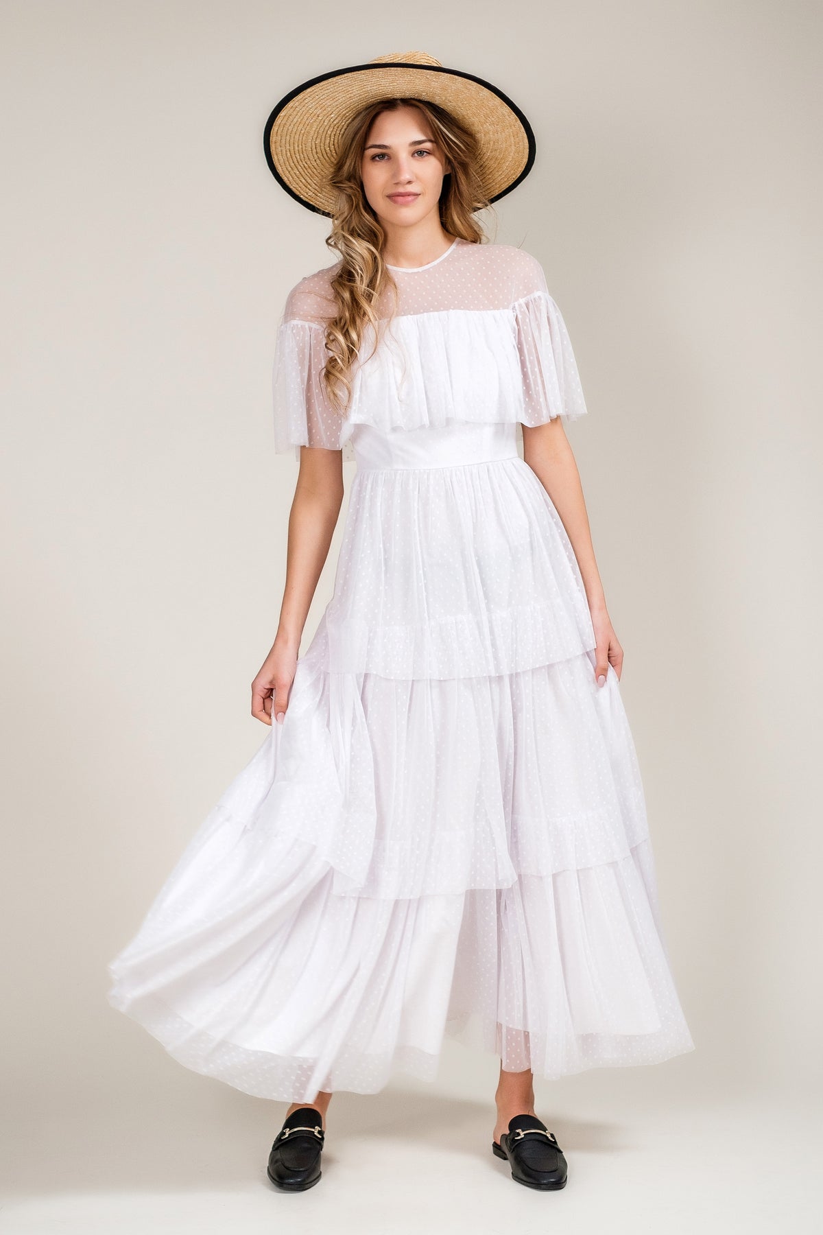 white long tulle dress front wide skirt medium long sleeves